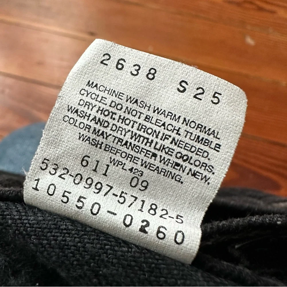 Vintage Levi’s 550 black cropped jeans
